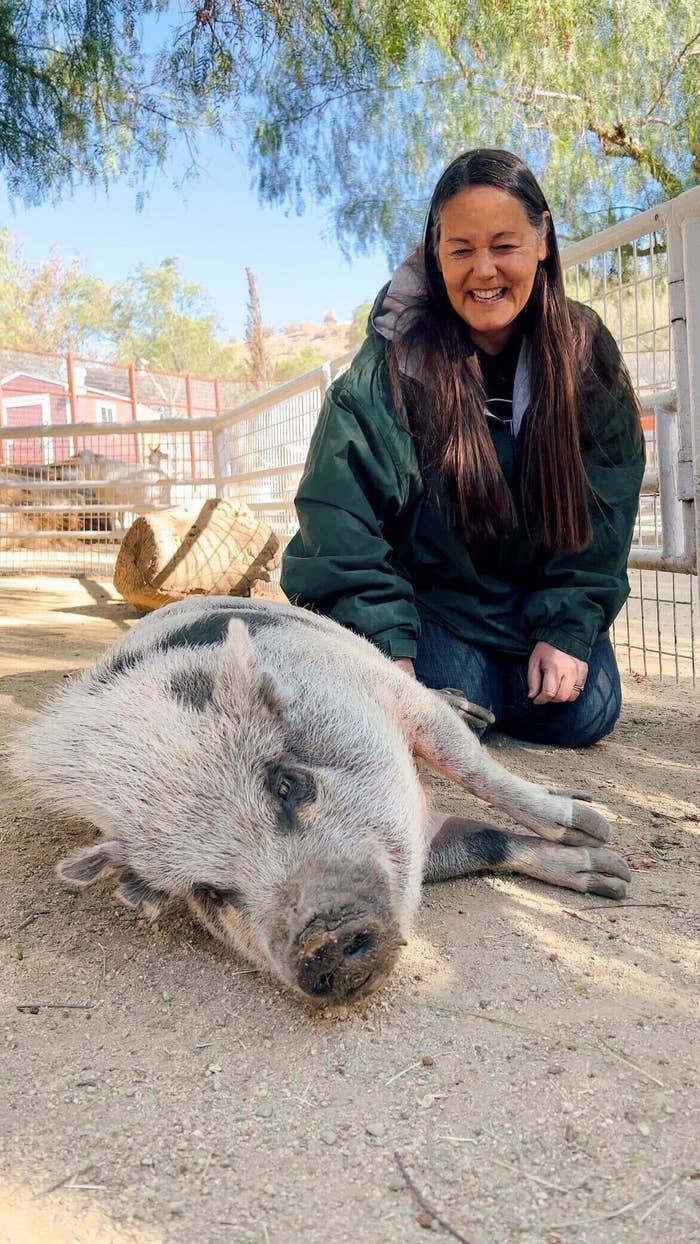 A woman with Pearl the pig