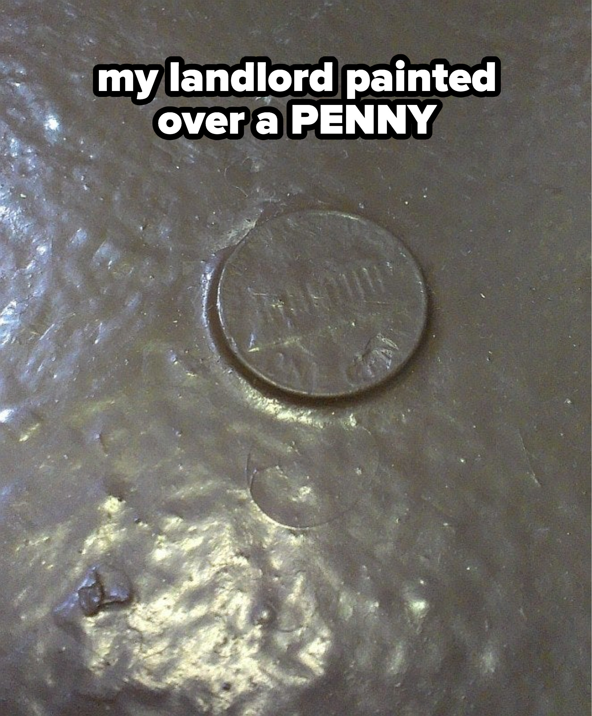 penny that has been painted over by a landlord