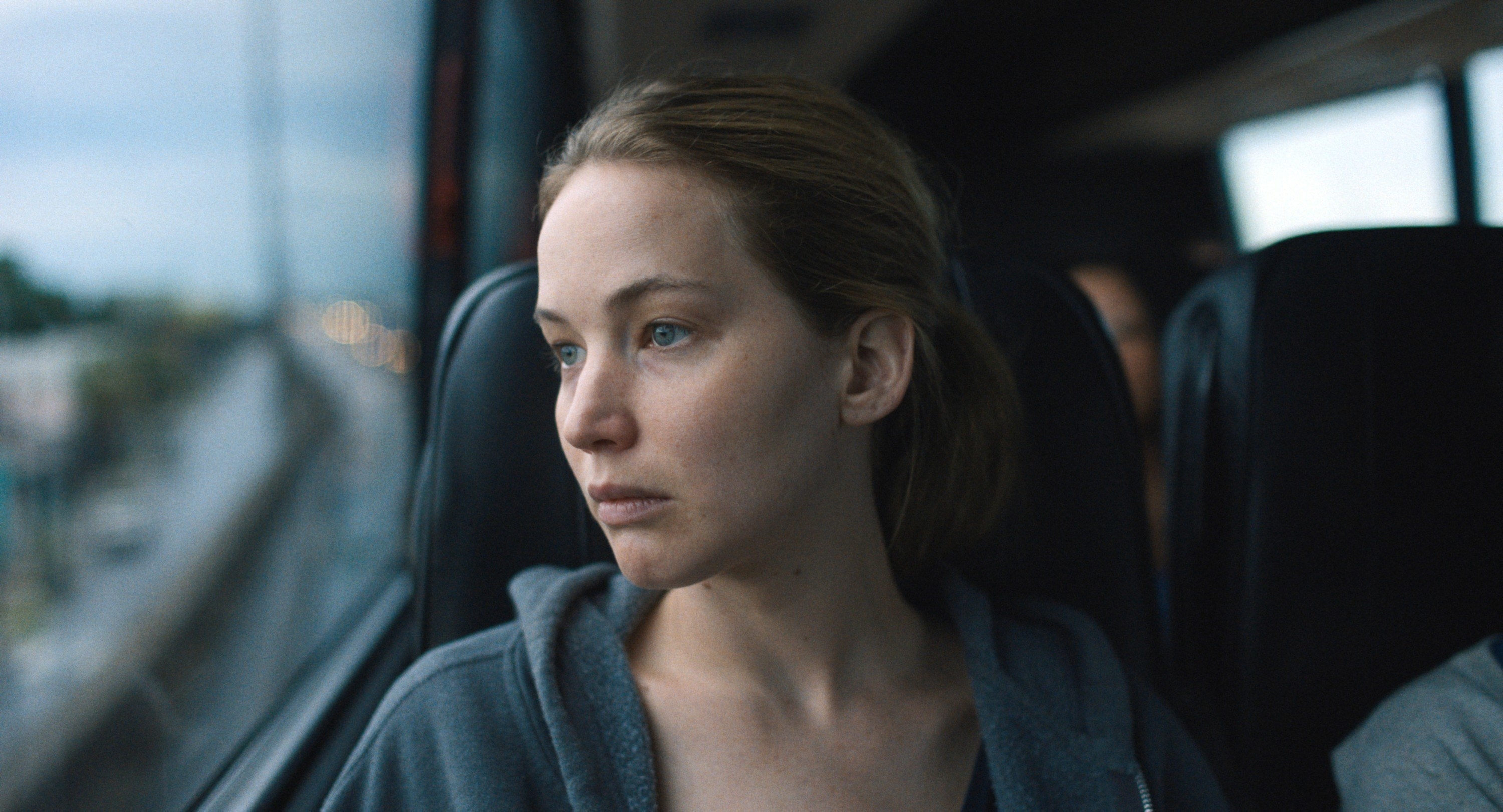 Jennifer Lawrence rides on a bus