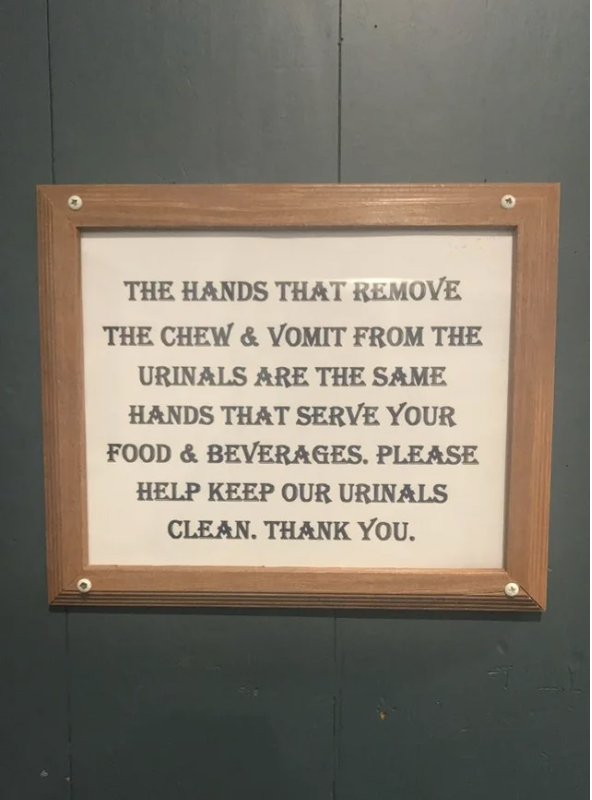 The sign says &quot;the hands that remove the chew and vomit from the urinals are the same hands that serve your food and beverages, keep our urinals clean&quot;
