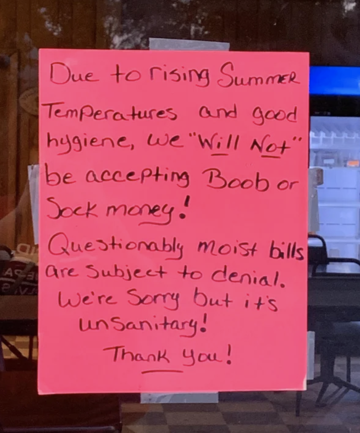 The sign says &quot;due to rising summer temperatures and good hygiene, we will not be accepting boob or sock money; questionably moist bills are subject to denial&quot;