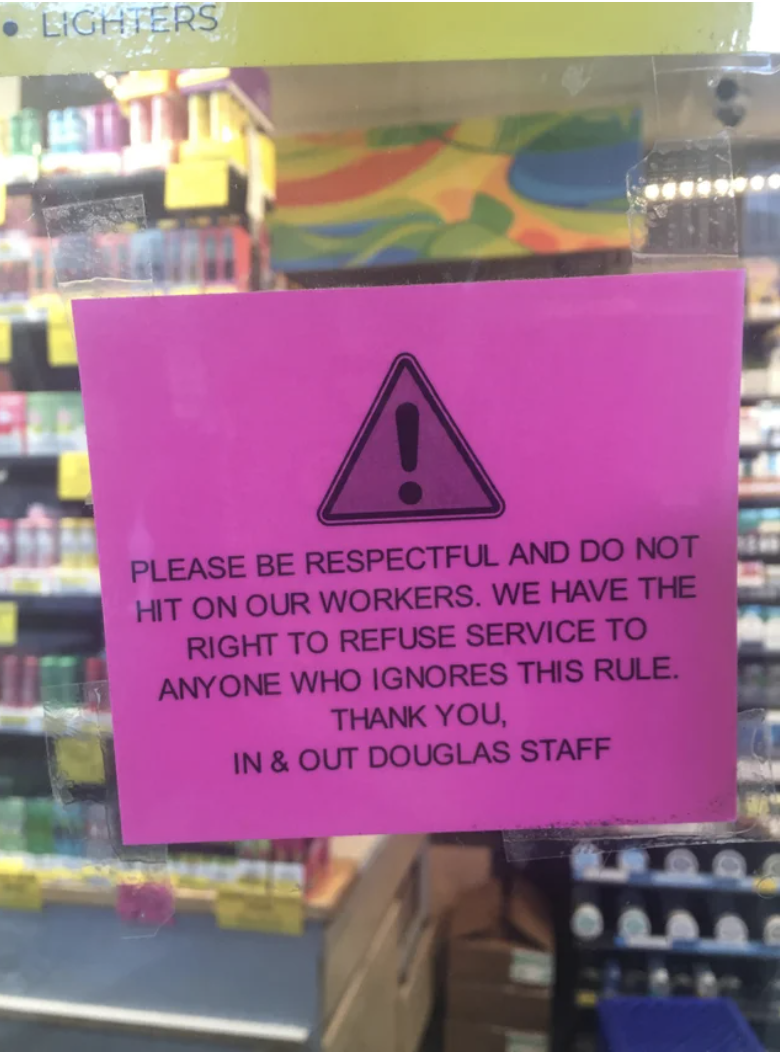 The sign says &quot;please be respectful and do not hit on our workers; we have the right to refuse service to anyone who ignores this rule&quot;