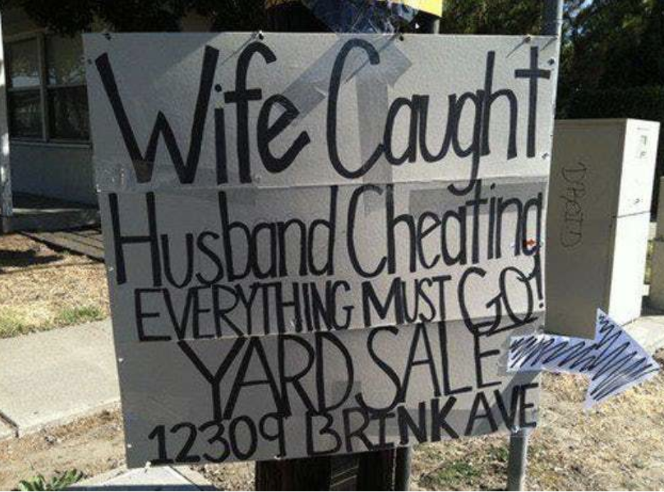 The sign says &quot;wife caught husband cheating, everything must go, yard sale&quot; with the address of the home