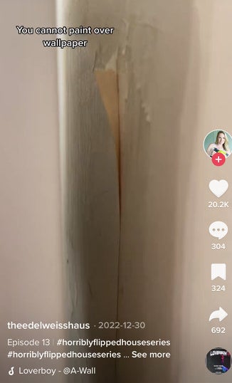 painted over wallpaper inside Kaitlin's horribly flipped house