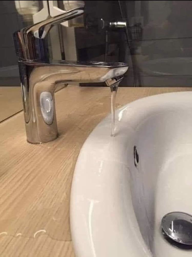 A faucet that&#x27;s not long enough to clear the side of the basin