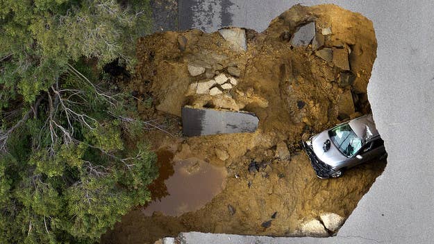 A mother and daughter were rescued by Los Angeles firefighters in Chatsworth, California this week, after a 15-foot sinkhole swallowed their vehicle. 