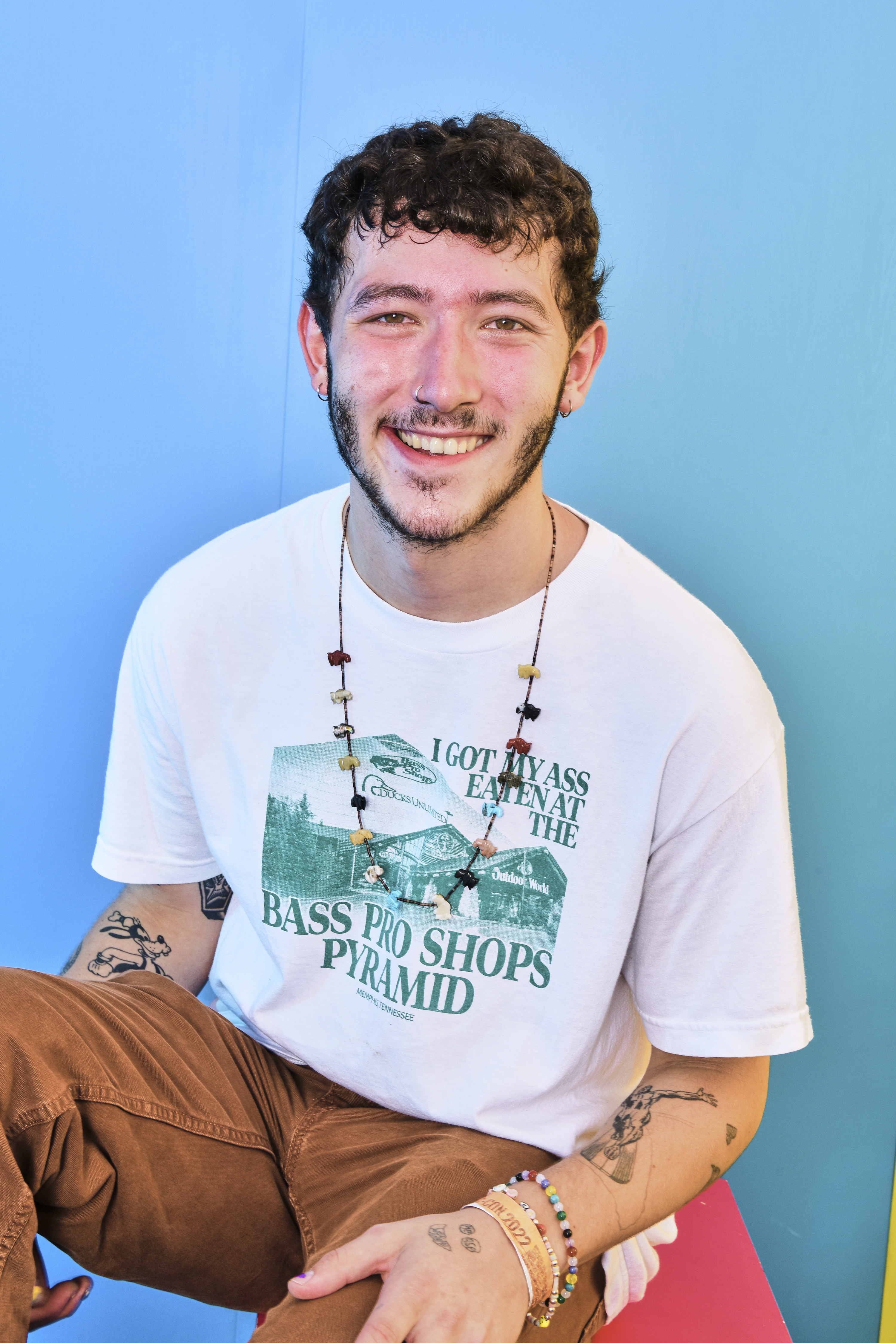 Close-up of Frankie smiling and wearing an &quot;I Got My Ass Eaten at the Bass Pro Shops Pyramid&quot; T-shirt