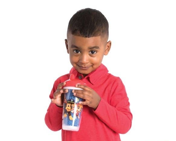 Boy holding cup