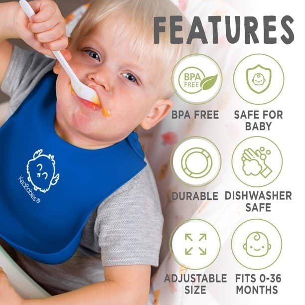 Child eating with bib on