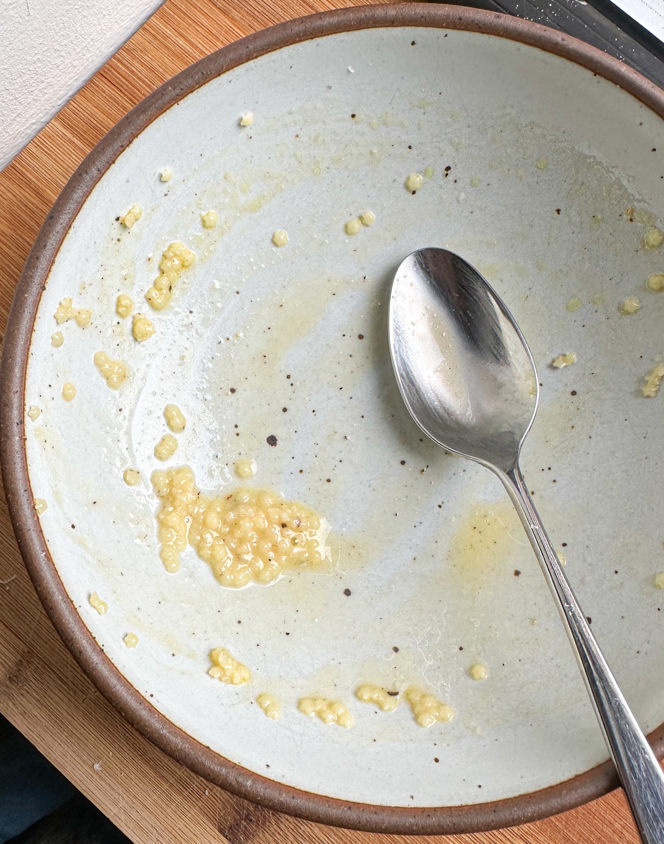 spoon in nearly empty bowl of pastina
