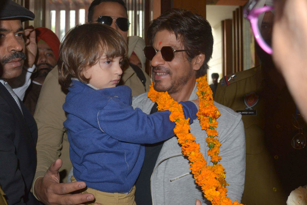 Shah Rukh Khan carries his son Abram