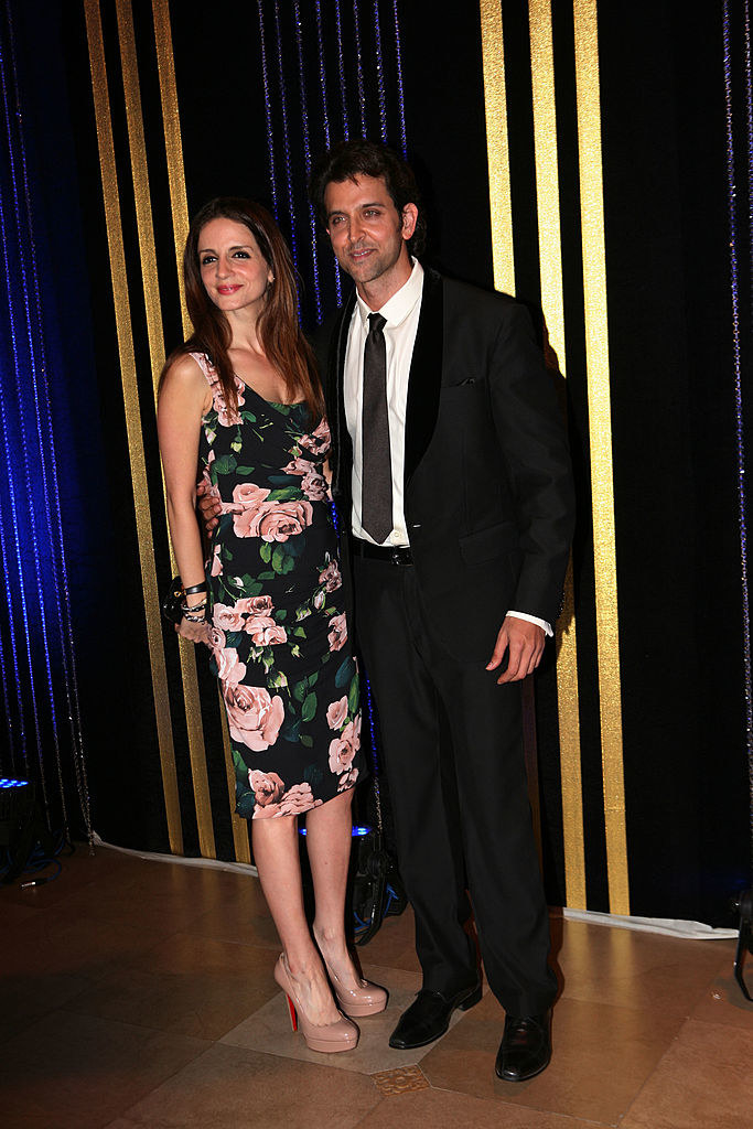Hrithik Roshan and Sussanne Khan pose for photos at a party