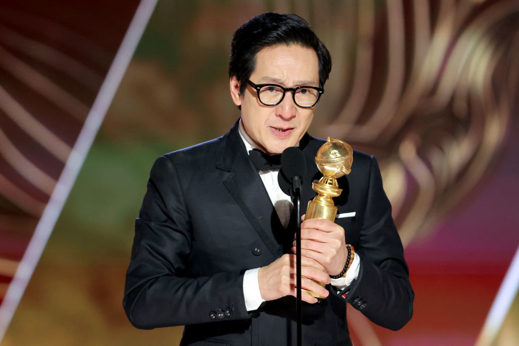 Ke Huy Quan accepts an award onstage at the 80th Annual Golden Globe Awards