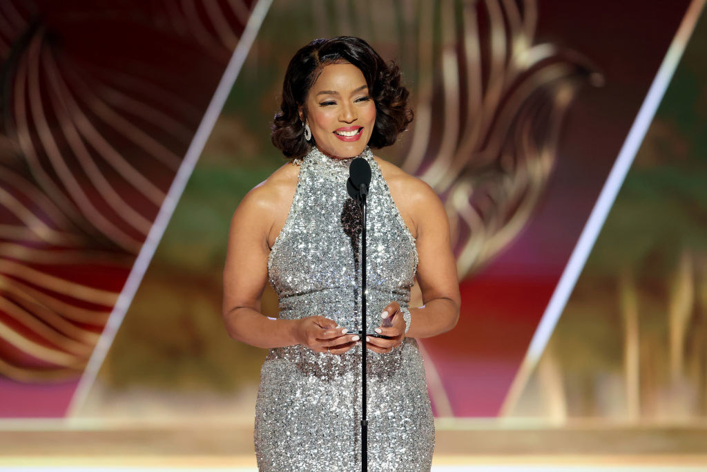 Angela Bassett accepts the Best Supporting Actress in a Motion Picture award