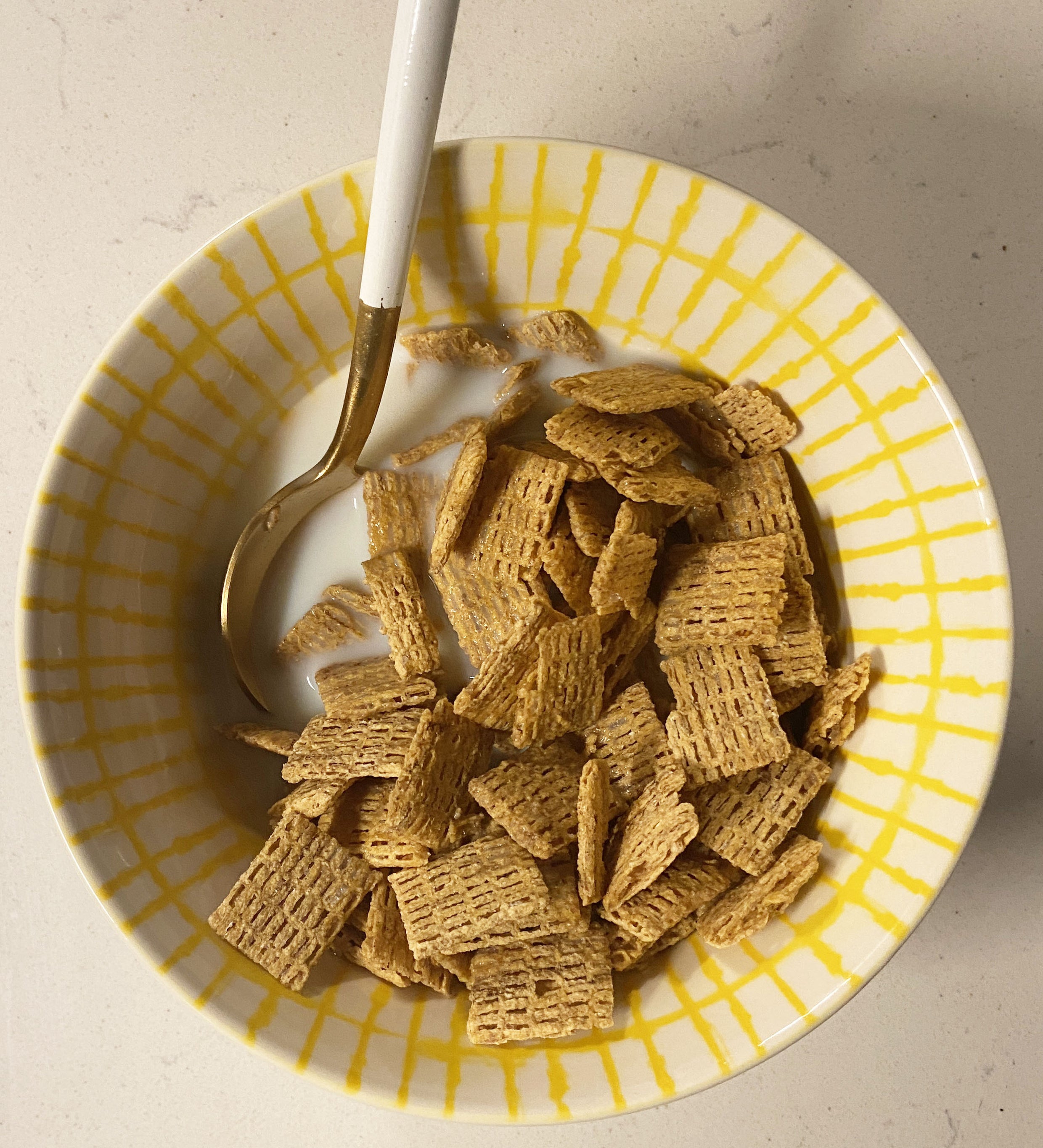 A bowl of cinnamon oat bite cereal