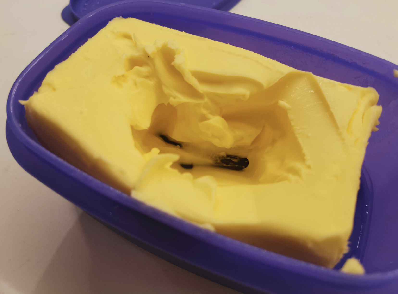 Butter with scoops taken out