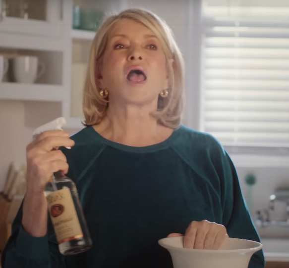 screenshot of ad: martha spraying tito&#x27;s vodka into her mouth