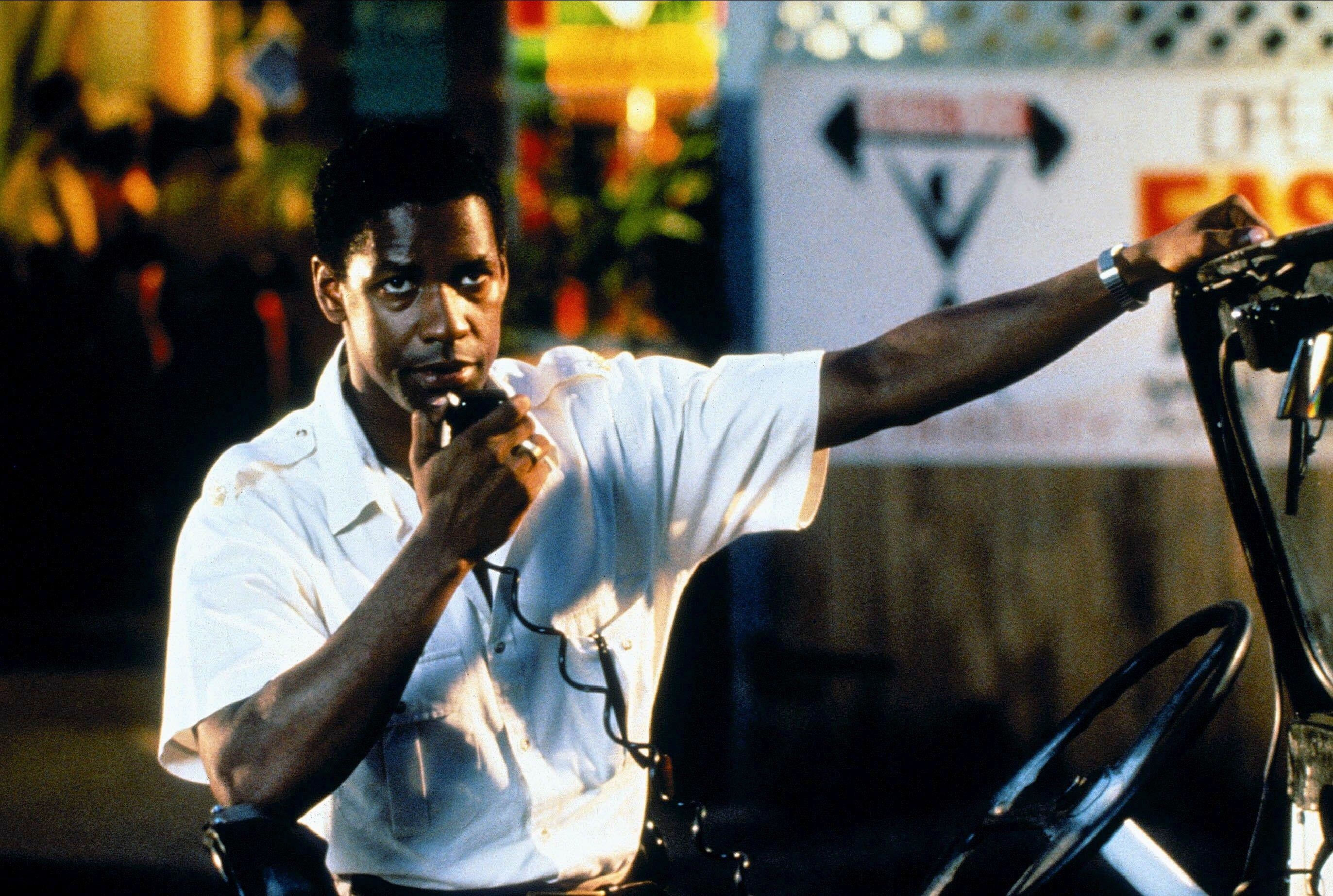 Denzel Washington playing a cop