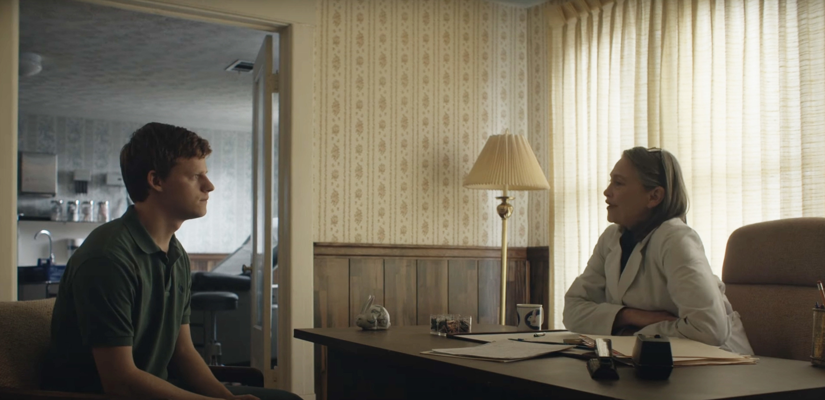 A young man talking to a doctor