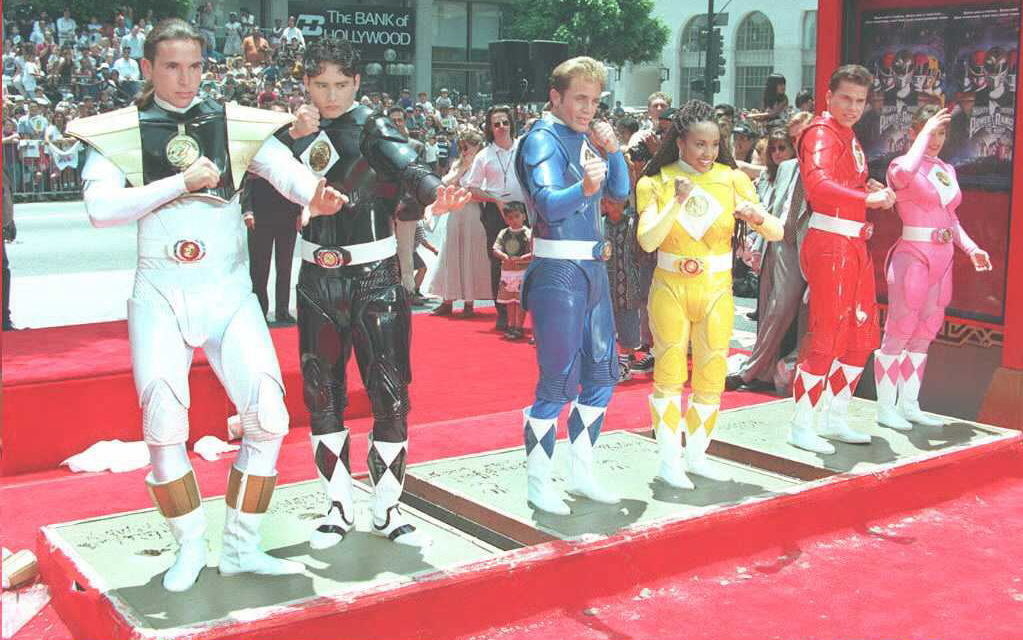 The Mighty Morphin Power Rangers strike poses as they stand in cement 22 June at Mann&#x27;s Chinese Theater in Hollywood
