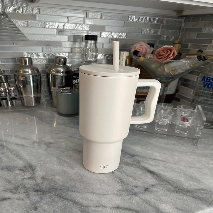 a cream colored simple modern cup