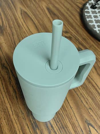 a mint colored simple modern cup