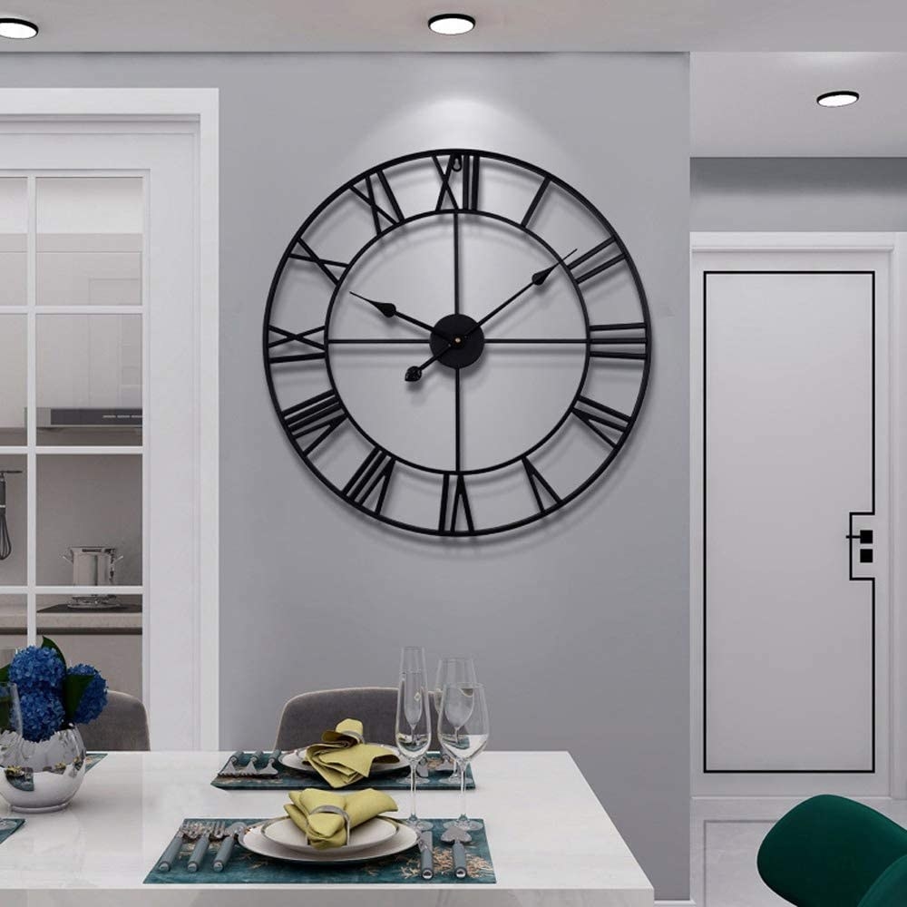 The clock hanging in a kitchen