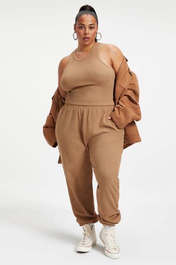 model wearing the tan brown pants