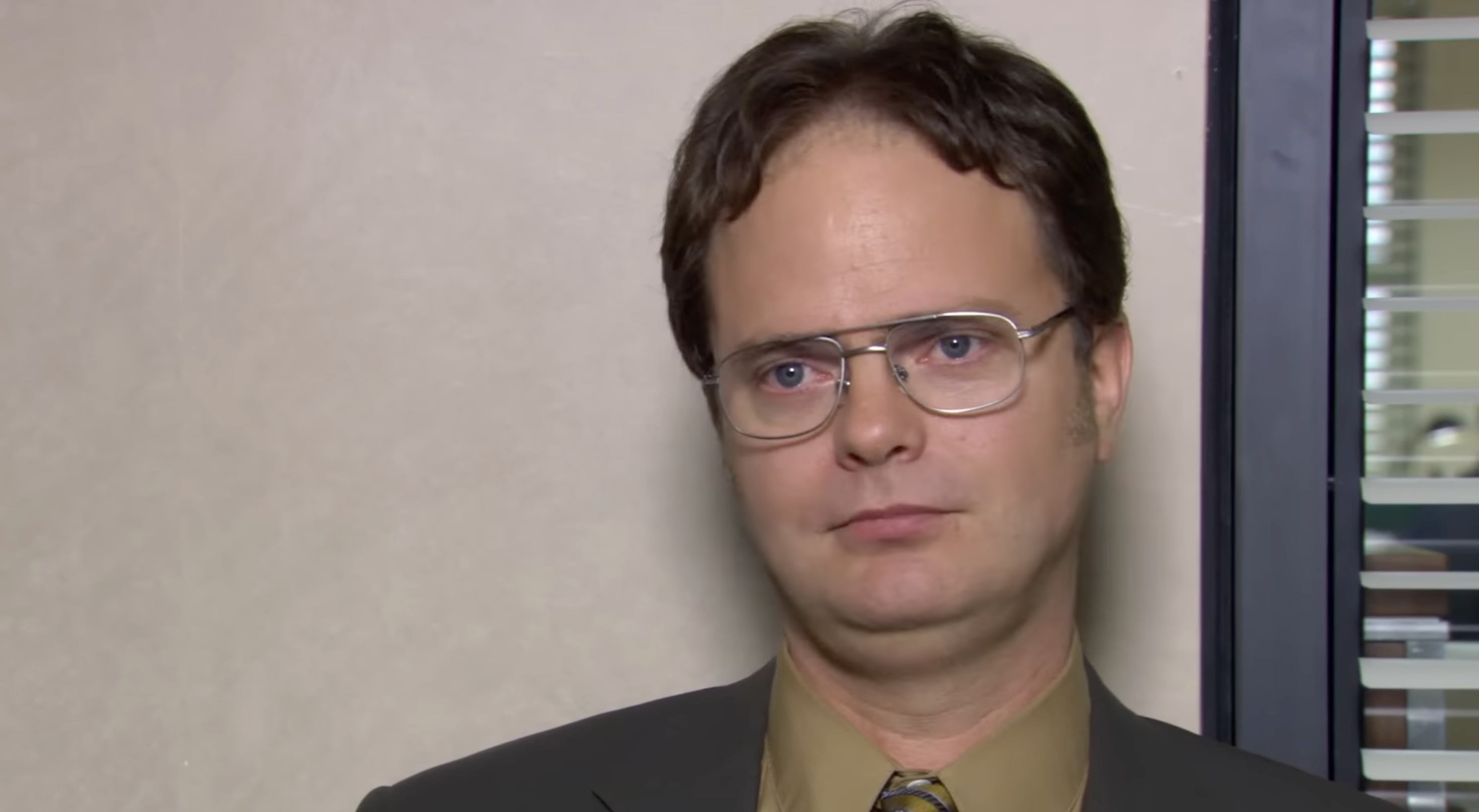 Dwight Schrute looking unamused at the camera
