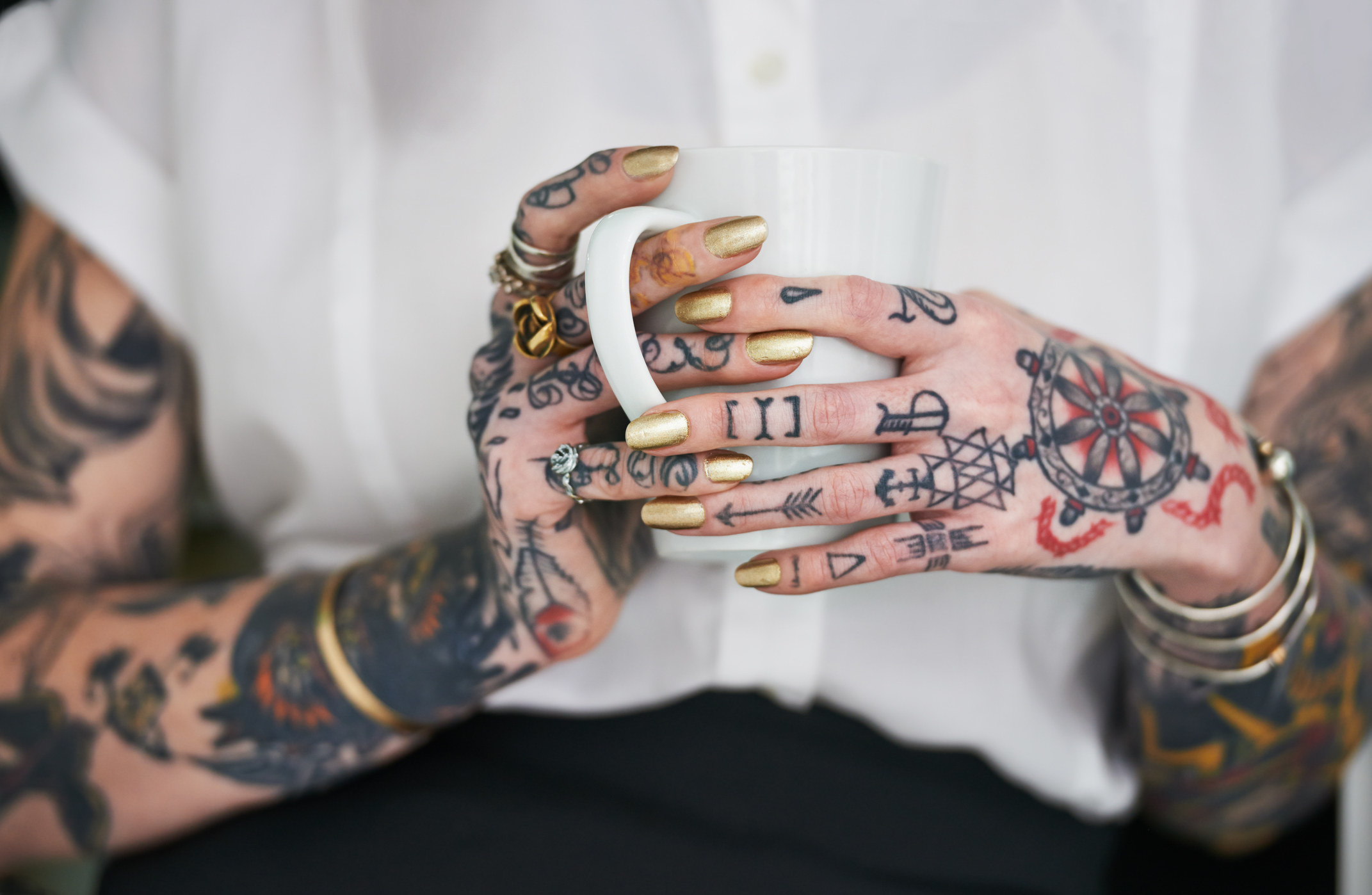 tattoo-covered hands