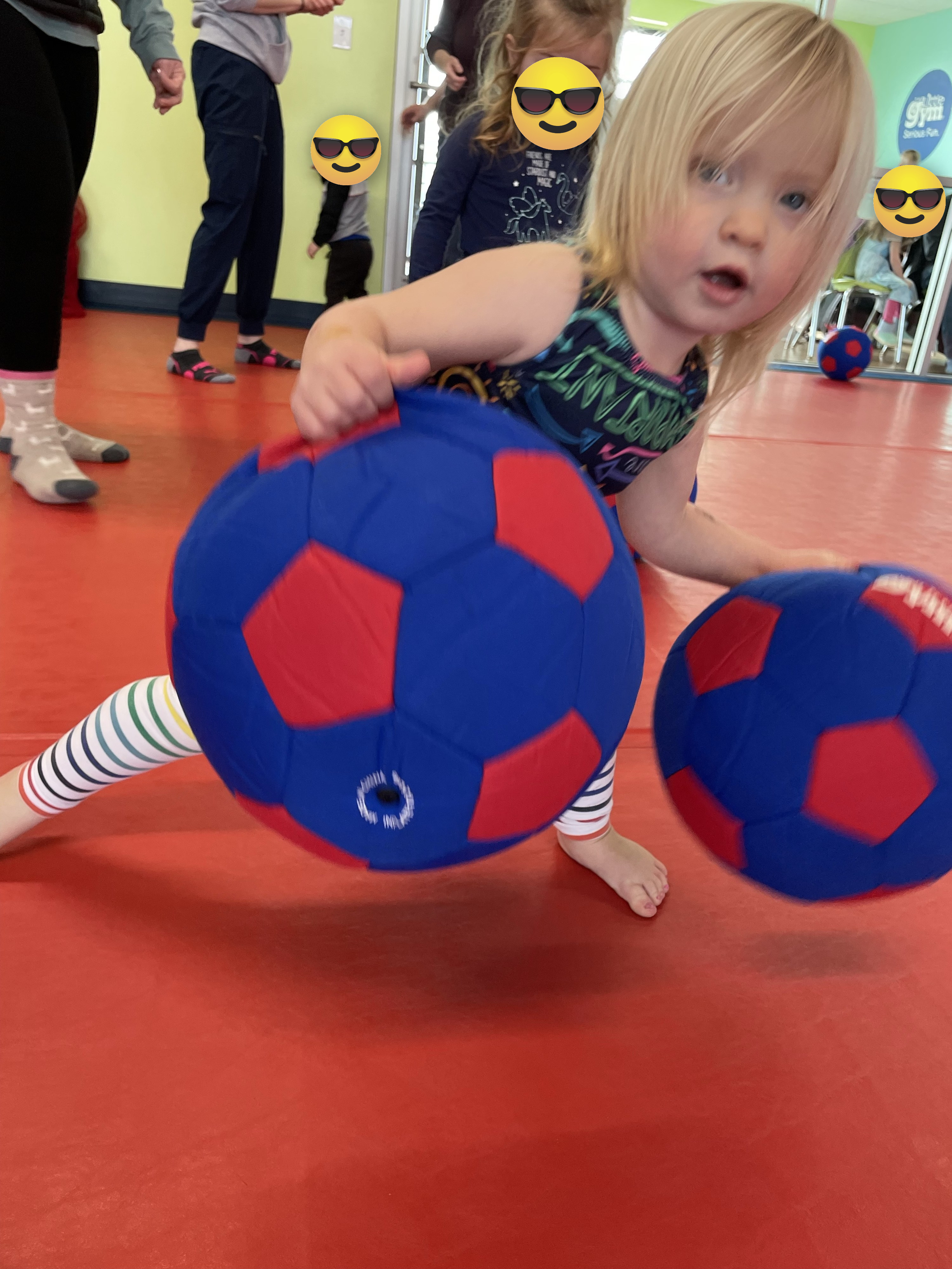 the author&#x27;s daughter playing with soccer balls