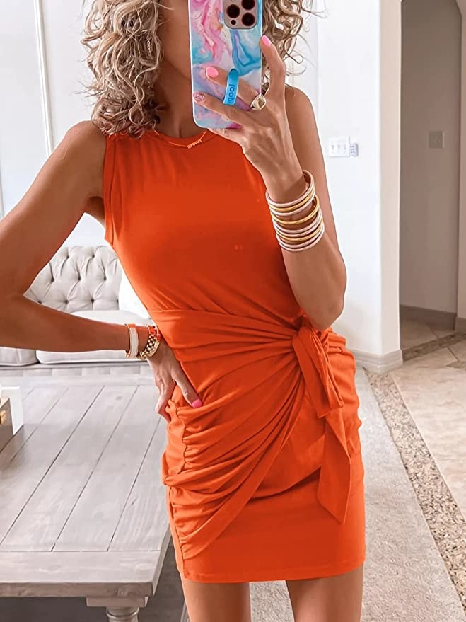 person taking a selfie with the wrap dress