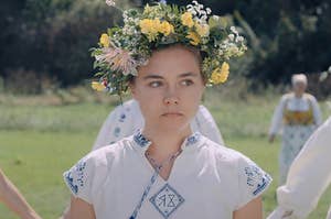 Florence Pugh wearing a flower crown as Dani in Midsommar