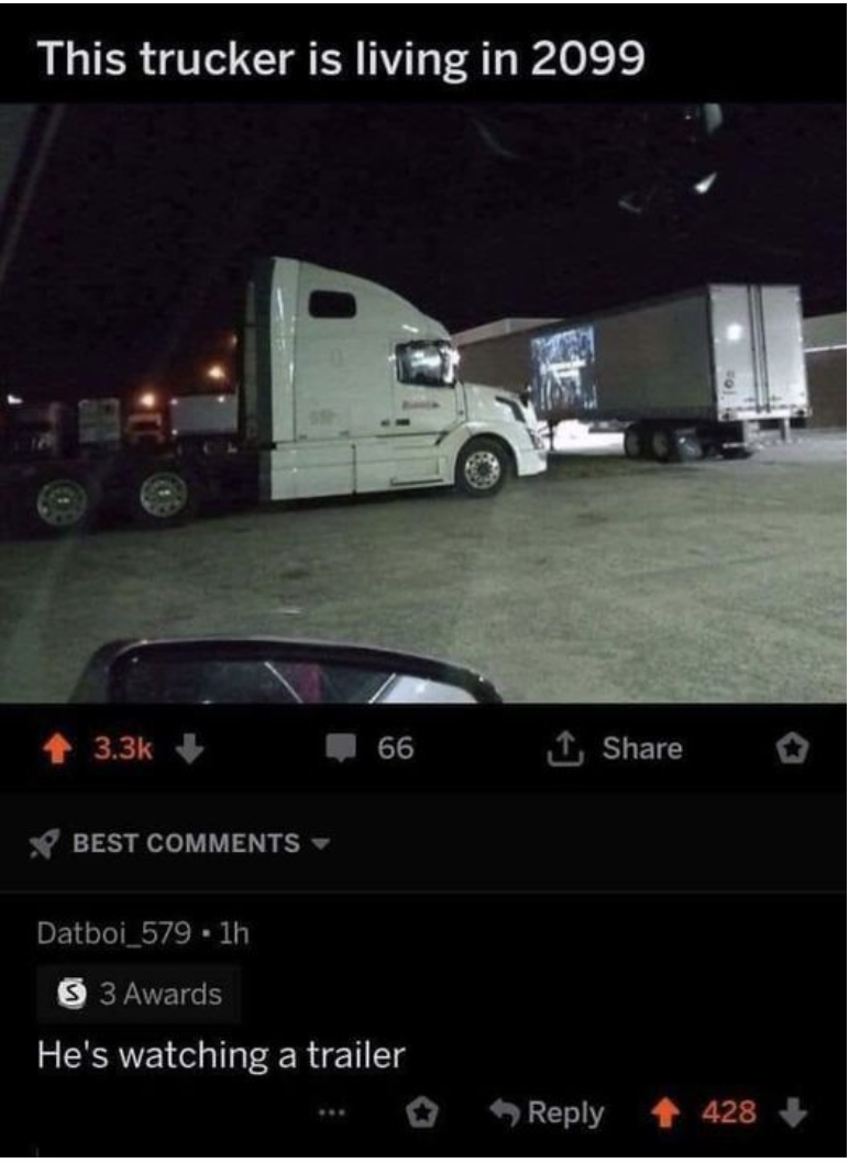 A truck driver has parked his truck next to a large trailer and using the trailer as a screen to project a movie onto; the comment response says &quot;he&#x27;s watching a trailer&quot;