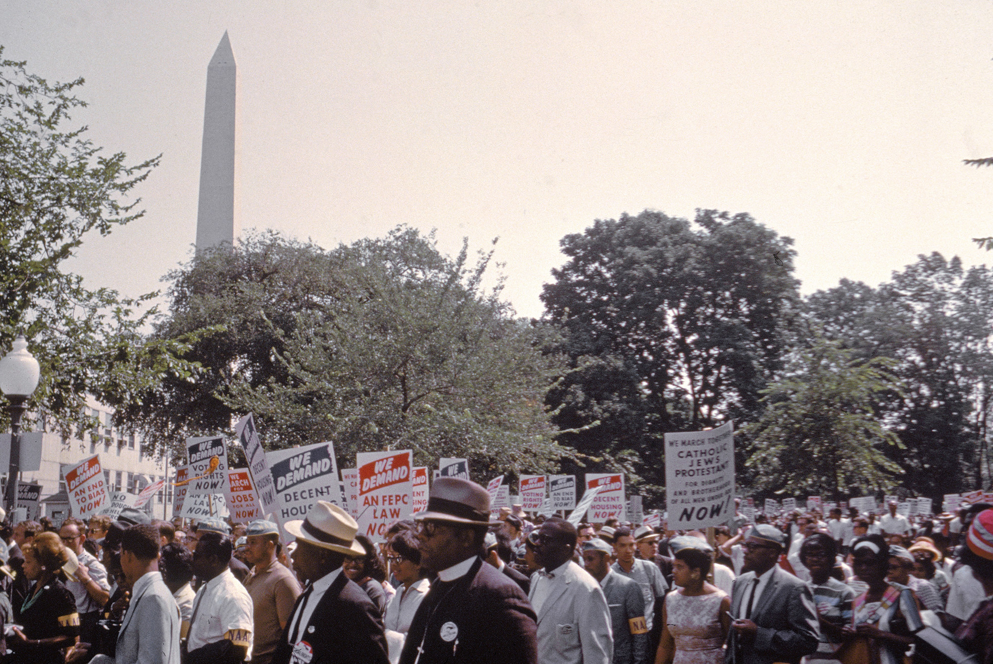 Attendees of the March on Washington are seen crowded in a street near the Washington Monument.