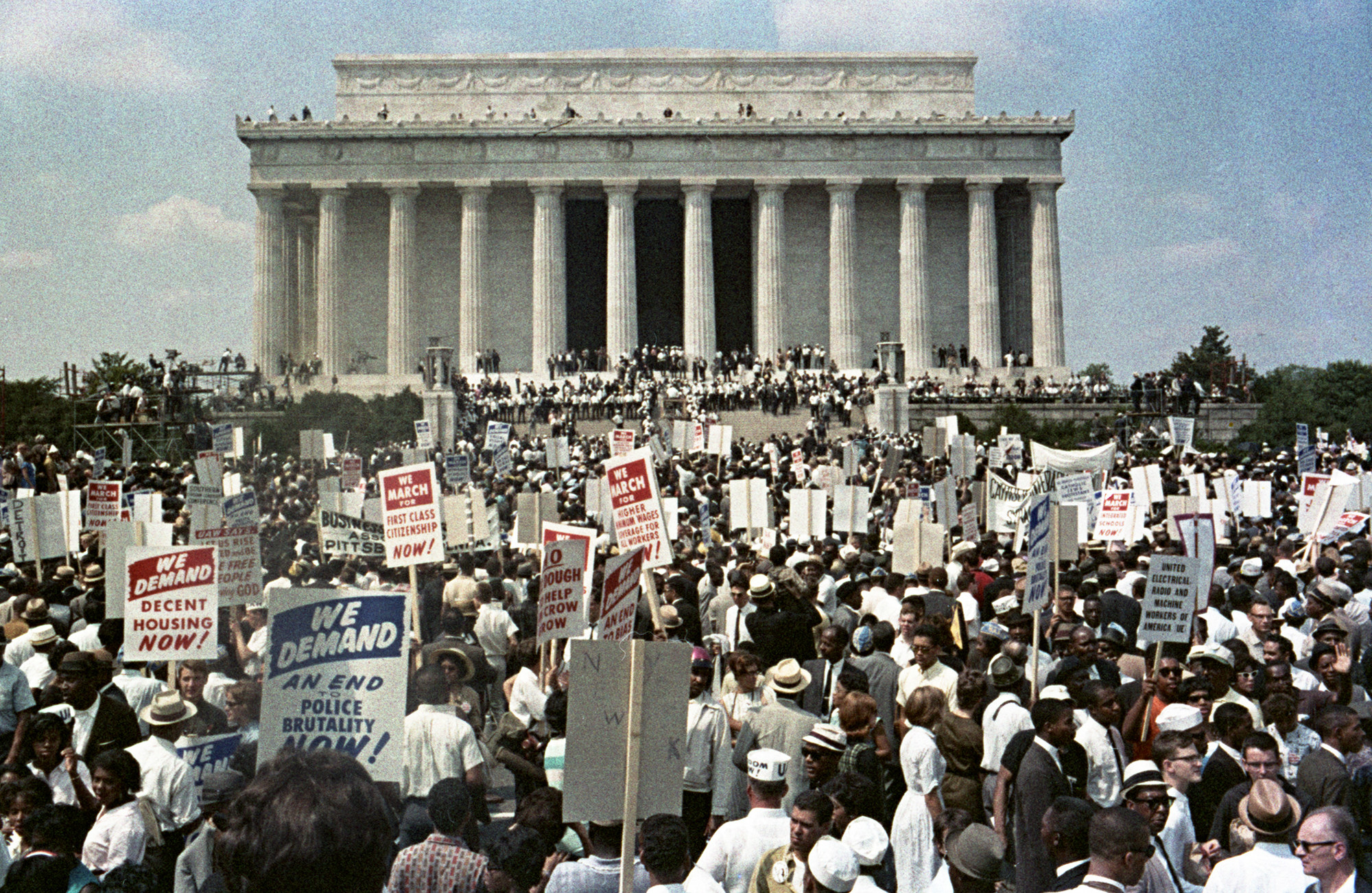 Attendees of the March on Washington gather around the Lincoln Memorial.