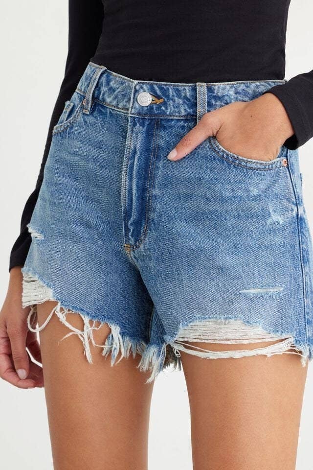 close up of the shorts on a model with on hand in the pocket