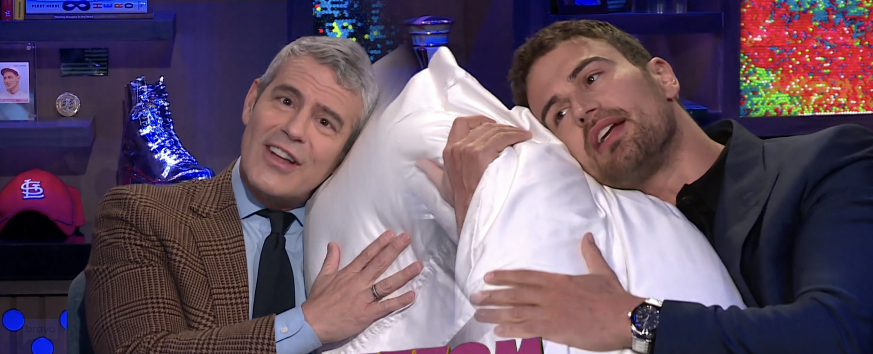 andy cohen and theo with pillows