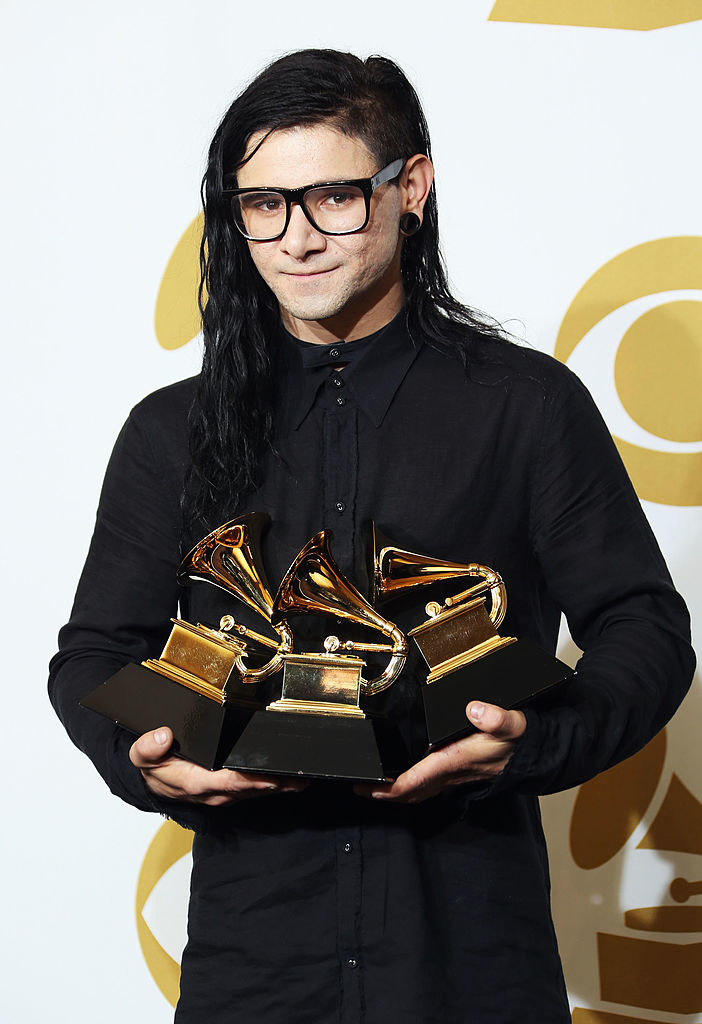 Skrillex holding Grammys