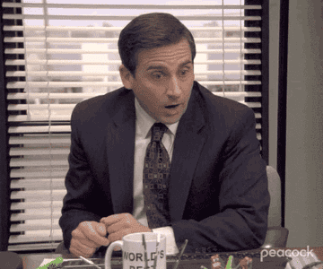 michael scott looking surprised on the office