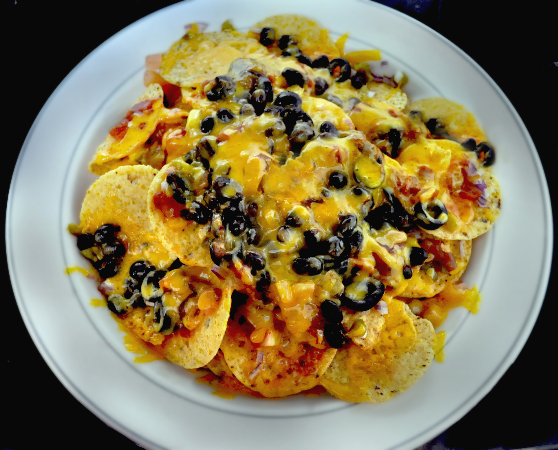 Nachos topped with black beans