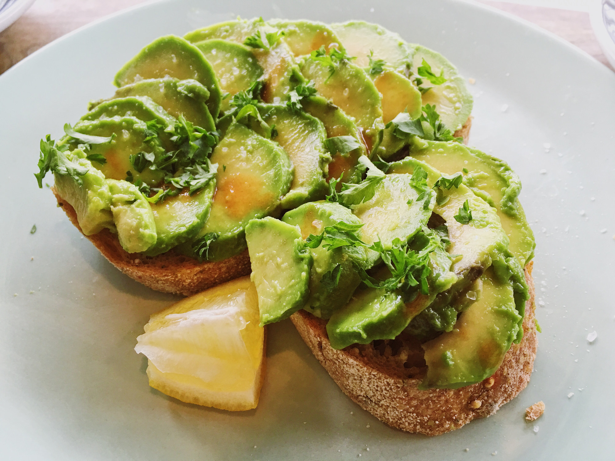 Close-up of sliced avocado on toast