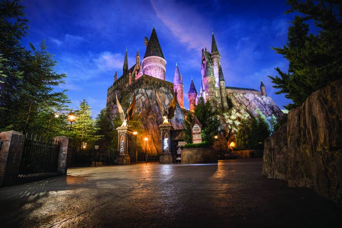 The Hogwarts Castle replica, built as part of "Harry Potter and the Forbidden Journey," is lit up for a nighttime light show