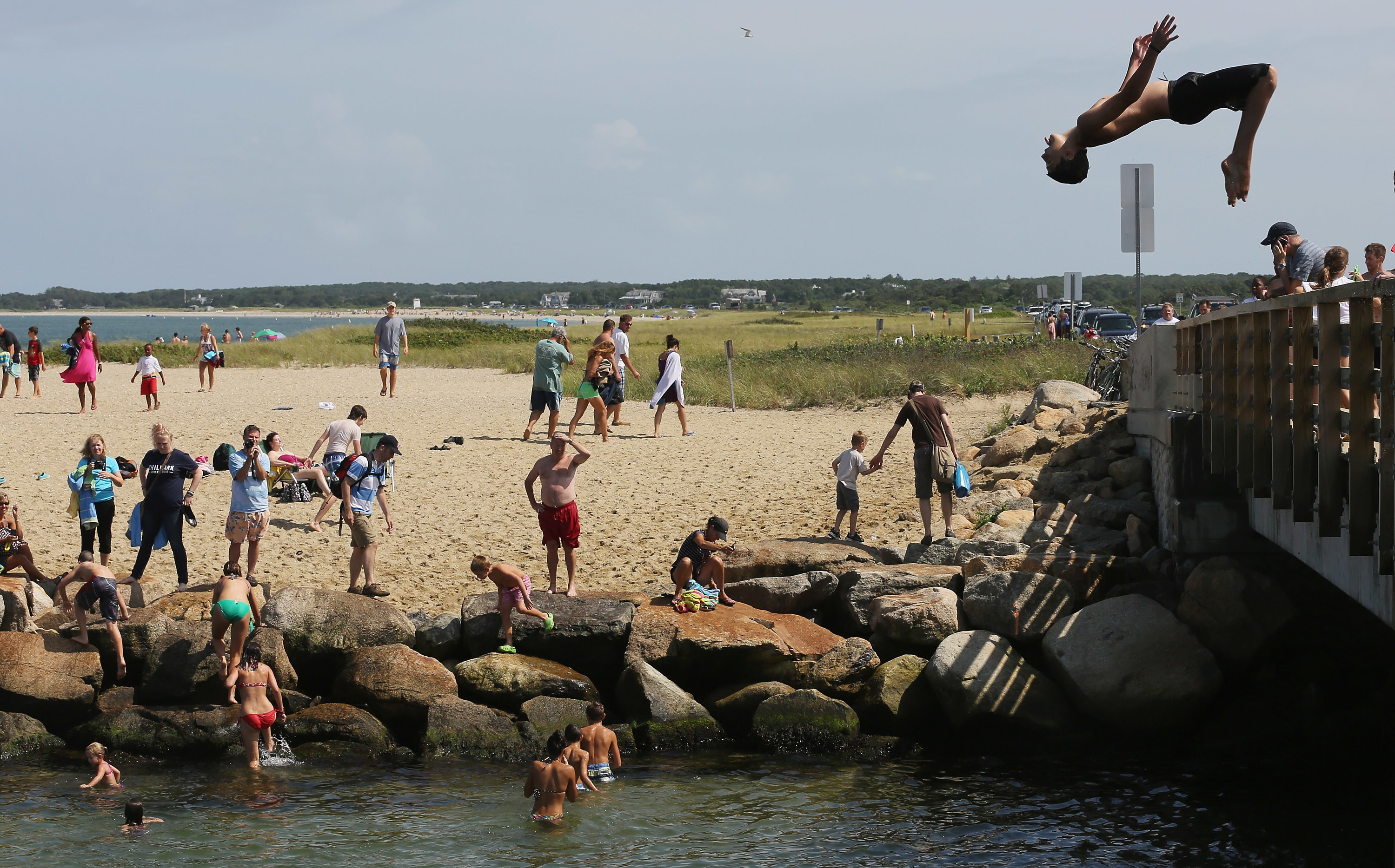 A boy jumps off &#x27;Jaws Bridge&#x27; during JawsFest: The Tribute in 2012, a festival celebrating the film &quot;Jaws,&quot; on the island of Martha&#x27;s Vineyard in Edgartown, Massachusetts