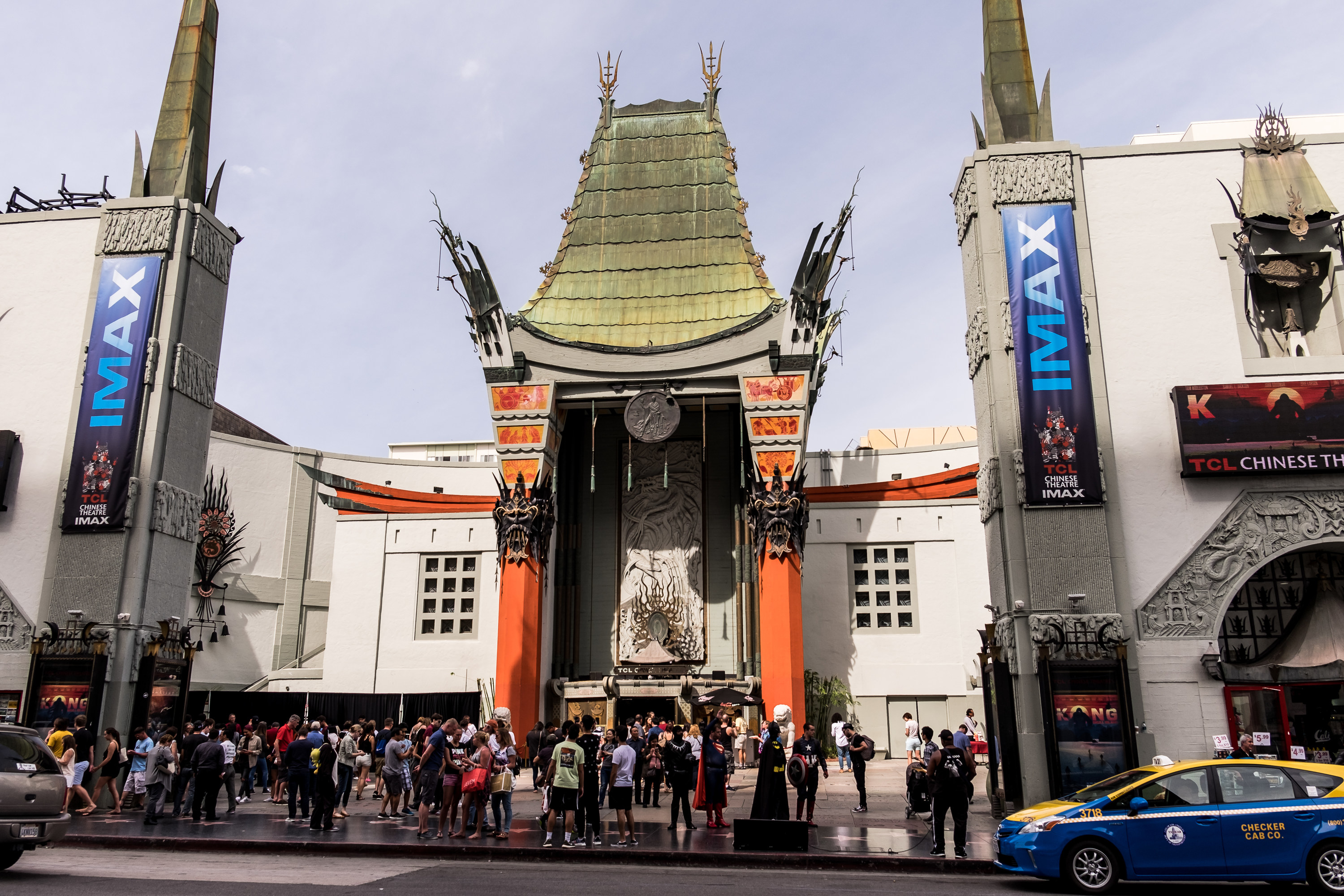 A crowd of people waiting the opening of the TCL Chinese Theater in Los Angeles