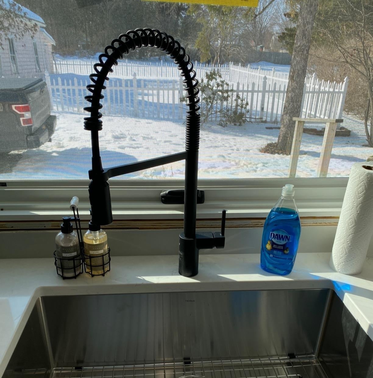 reviewer&#x27;s black faucet installed