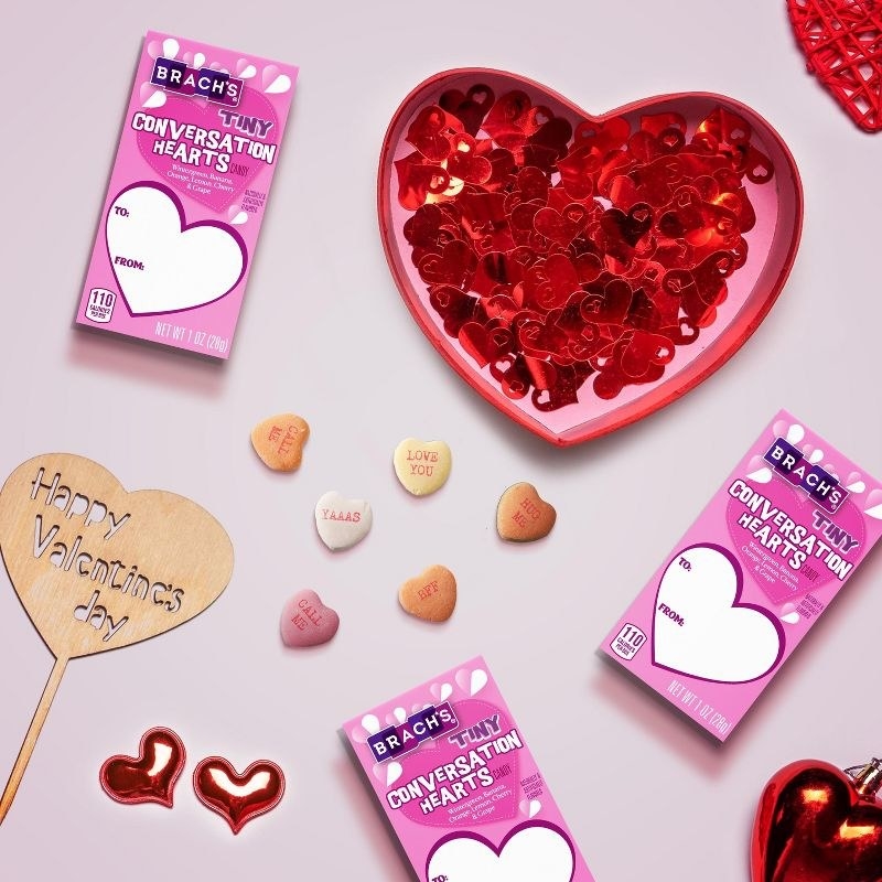 a flat lay of the conversation hearts and their packaging