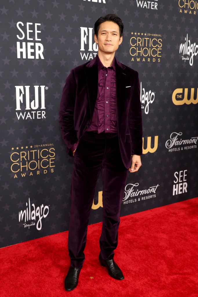 Harry Shum Jr. attends the 28th Annual Critics Choice Awards in a velvet purple suit