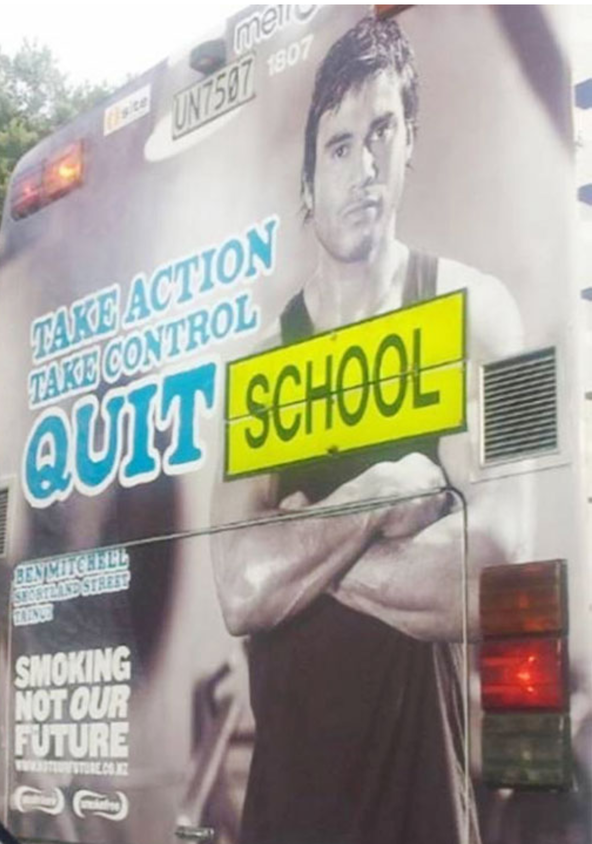 school bus that looks like it says &quot;quit school&quot;