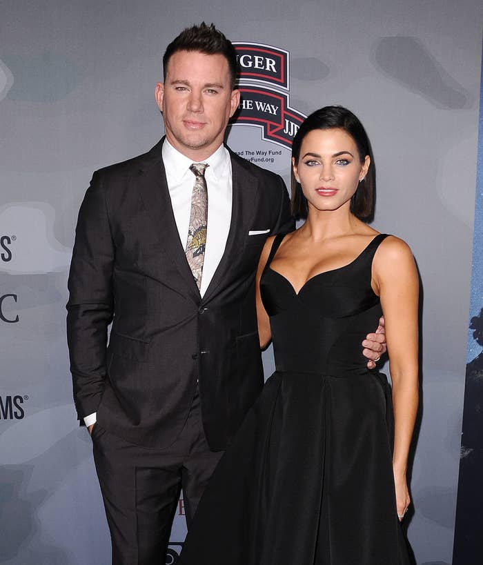 The former couple with their arms around each other as they pose on the red carpet for photographers